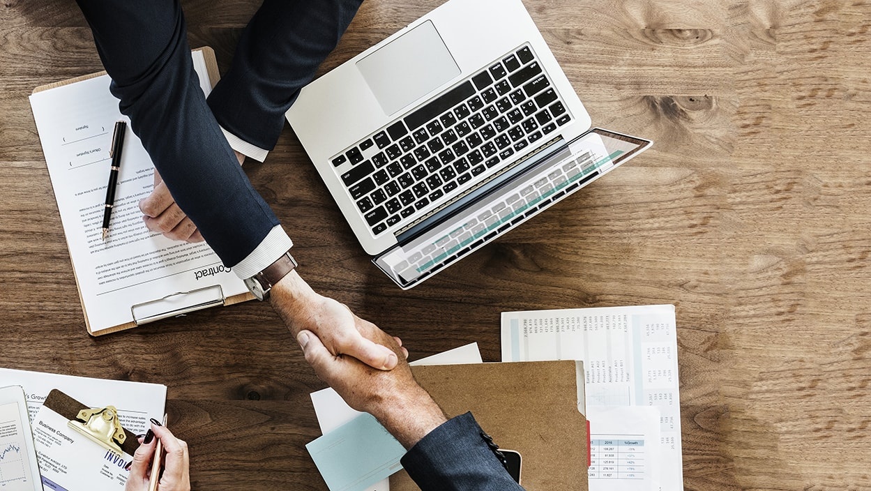 Two businessmen shaking hands